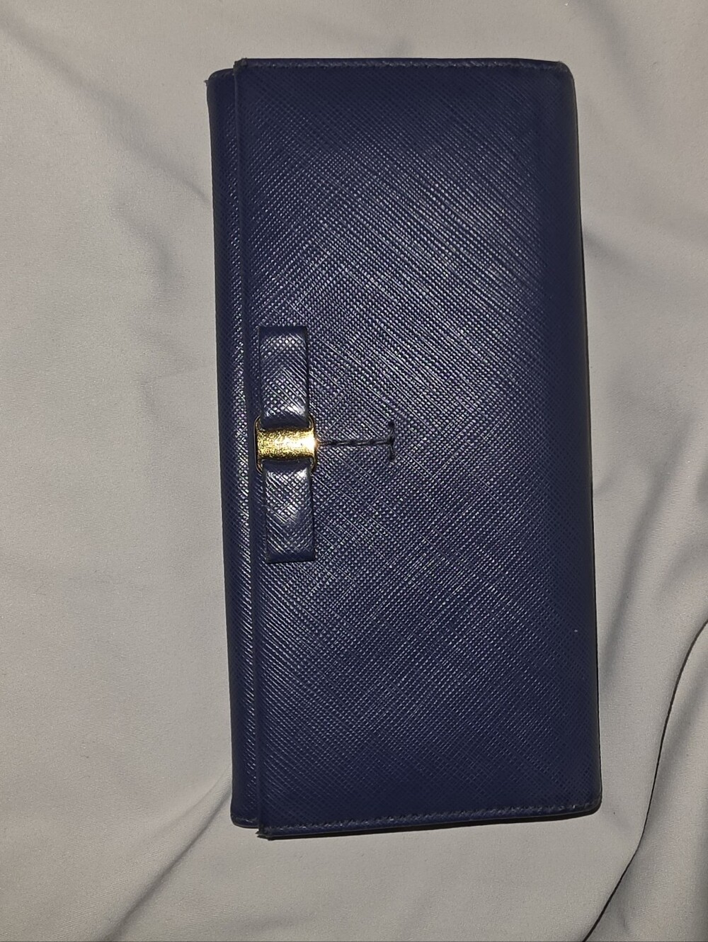 Salvatore Ferragamo Elegant Navy Long Wallet with Gold Bow Accent